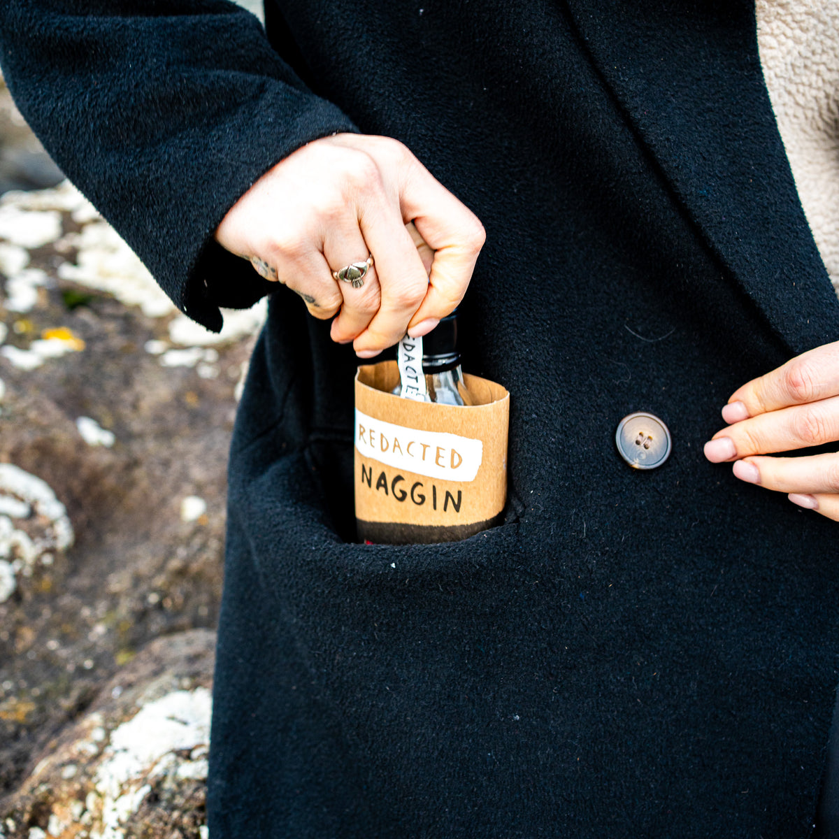 naggin of whiskey that fits in your pocket